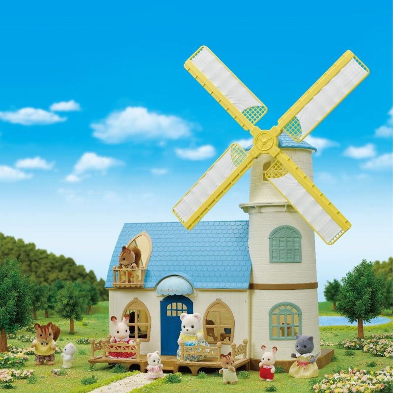 Sylvanian Families Celebration Windmill set features a whimsical windmill, Polar Bear figures, and cozy blue furniture for imaginative play.