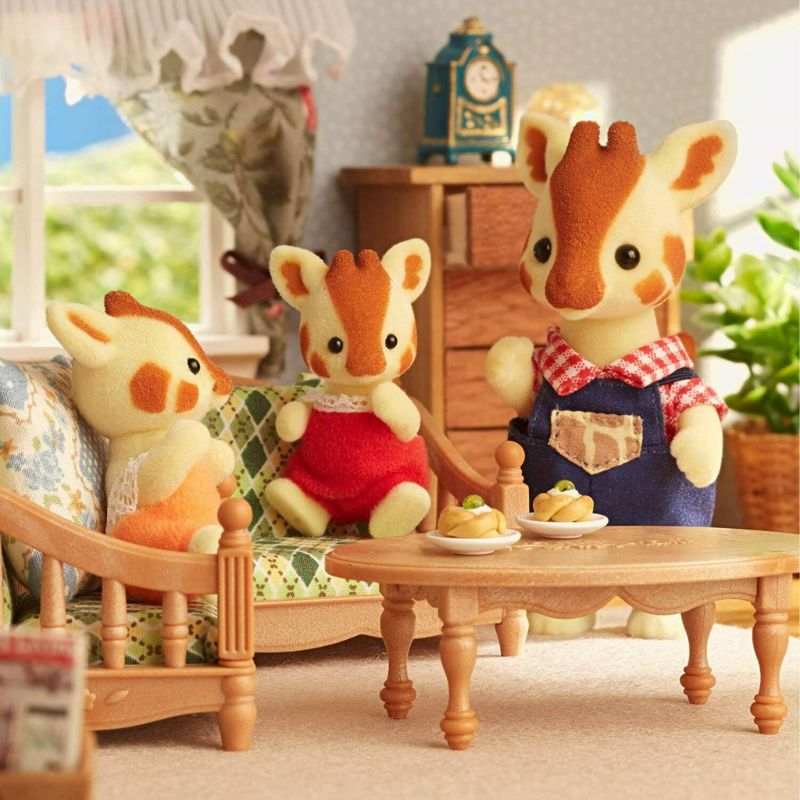 Sylvanian Families Highbranch Giraffe Family features a gentle giraffe dad, nurturing mom, and two playful kids, perfect for imaginative play.