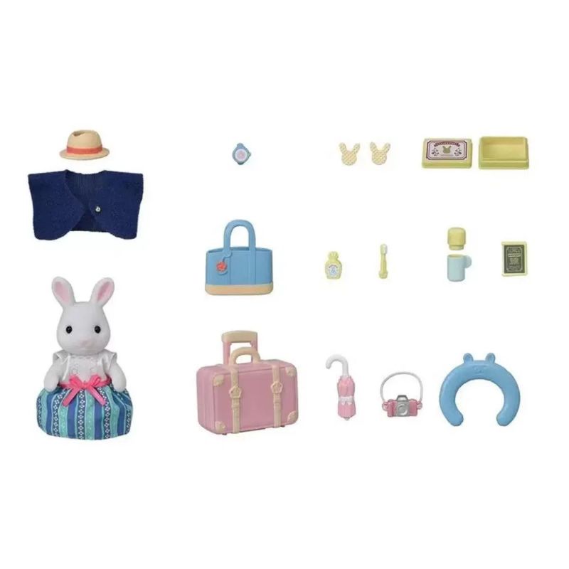 Sylvanian Families Weekend Travel Set featuring Emilia Snow Rabbit with suitcase, handbag, and travel accessories for imaginative play.