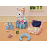 Sylvanian Families Weekend Travel Set with Emilia Snow Rabbit, suitcase, and travel accessories for imaginative play.