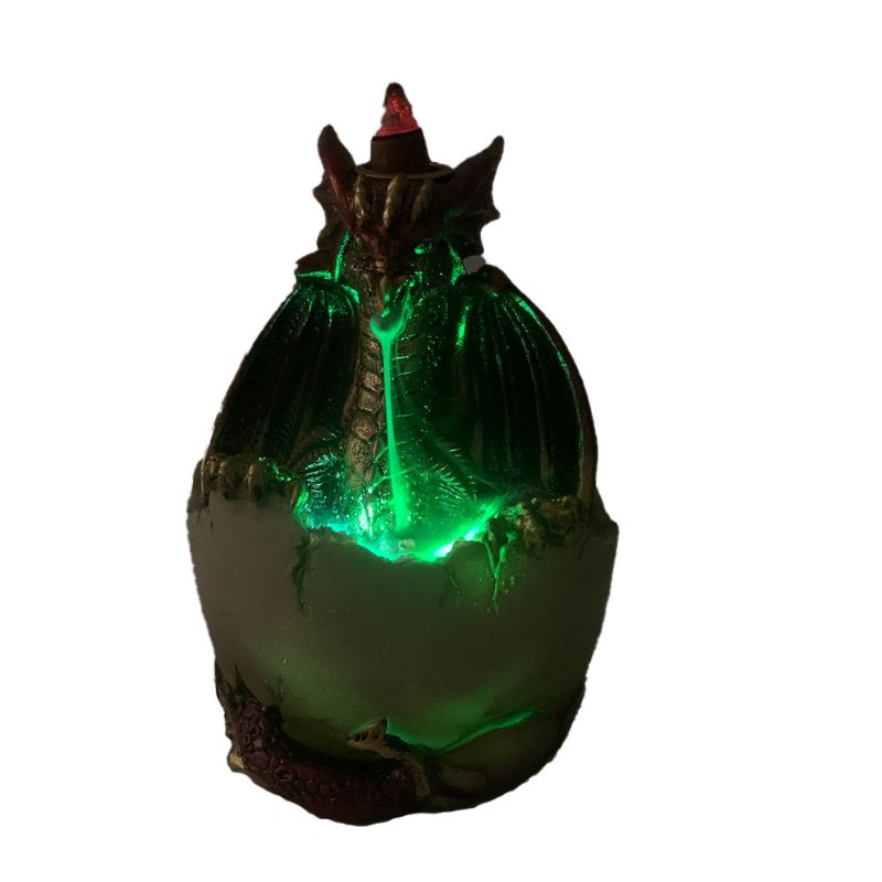 Intricate dragon design incense burner with glowing crystals, creating a mesmerizing smoke waterfall effect.
