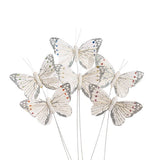 Elegant 10cm white pick butterflies, pack of 12, perfect for crafts, decorations, and floral arrangements.