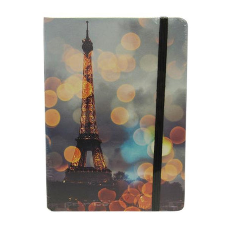 Elegant notebook with Eiffel Tower design, 96 lined pages, elastic closure; perfect for stylish note-taking on the go.