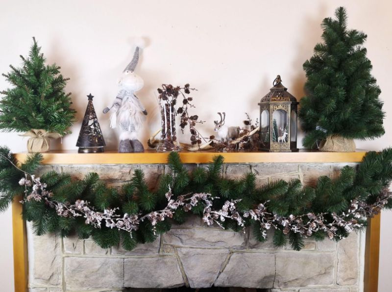 Decorative 1.8m cone garland with faux snow finish, perfect for festive indoor and outdoor holiday decor.