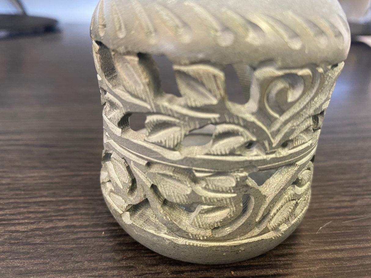 Soapstone Aroma Therapy Oil Burner with fine carvings, perfect for enhancing ambiance and enjoying essential oils.