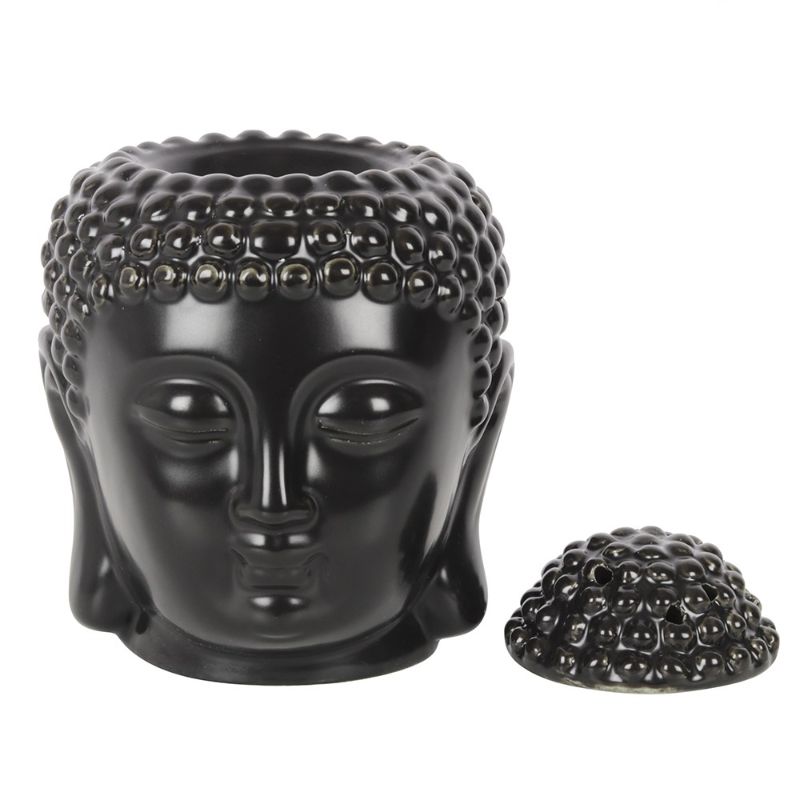 Elegant matte black ceramic Buddha head oil burner, perfect for creating a calming atmosphere with essential oils or wax melts.