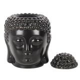 Elegant matte black ceramic Buddha head oil burner, perfect for creating a calming atmosphere with essential oils or wax melts.