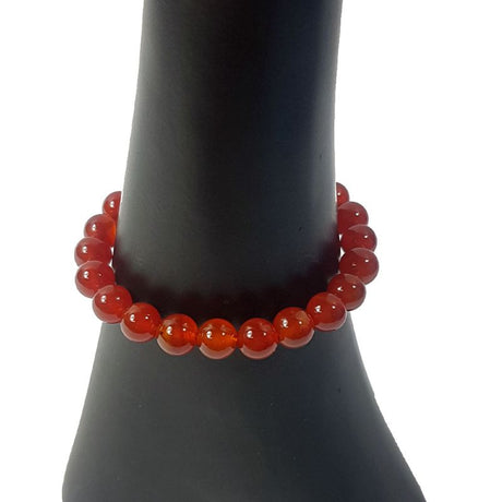 Pack of 3 vibrant carnelian bead bracelets, featuring 8mm beads known for promoting motivation and creativity.