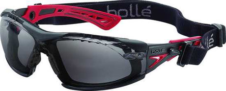 Bolle Rush+ Gasket Safety Glasses with smoke lens, red and black frame, offering UV protection and customizable comfort.