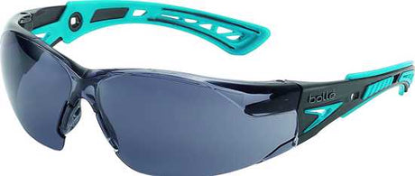 Bolle Rush+ Small Safety Glasses with smoke lens: sporty design, flexible temples, anti-fog, UV protection, and customizable fit.