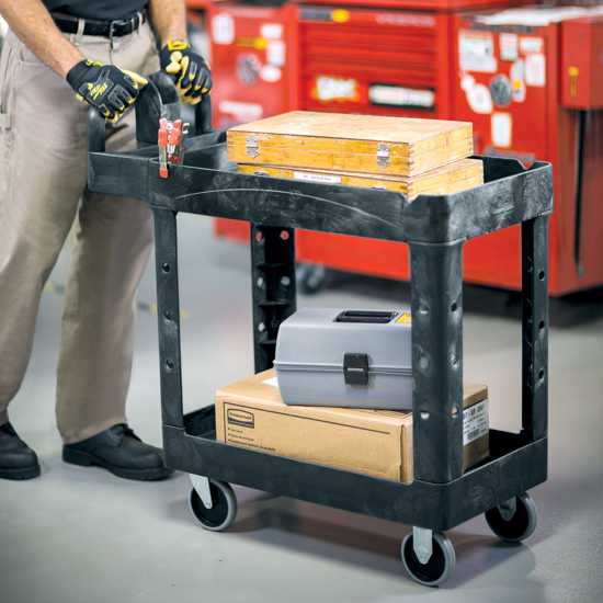 Rubbermaid heavy duty black utility cart with two lipped shelves, ergonomic handle, and 226 kg load capacity for easy transport.
