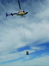 DrumGrab Drum Lifter in safety yellow, designed to lift 205-liter drums, with a 1000kg capacity for safe handling.