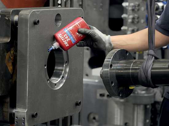 LOCTITE 243 medium strength threadlocker in blue liquid form, ideal for securing bolts and nuts against vibration.