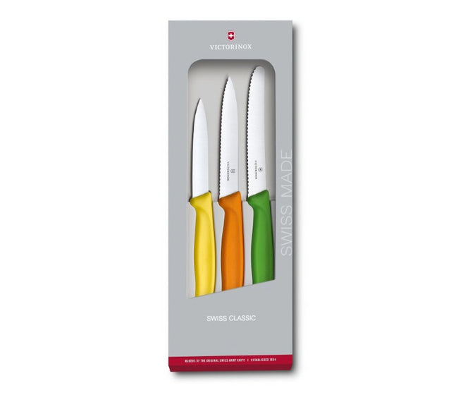 Vibrant Victorinox Swiss Classic Paring Knife Set in yellow, orange, and green for precise food preparation.