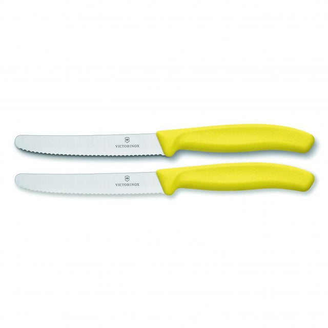 Yellow Victorinox Steak & Tomato Knife set with wavy edges, ergonomic handles, and stainless steel blades for precise slicing.