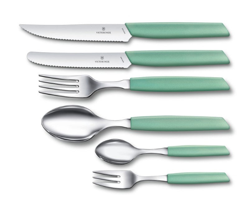 Mint-colored Victorinox Swiss Modern Table Fork with a sleek design and comfortable synthetic handle for stylish dining.