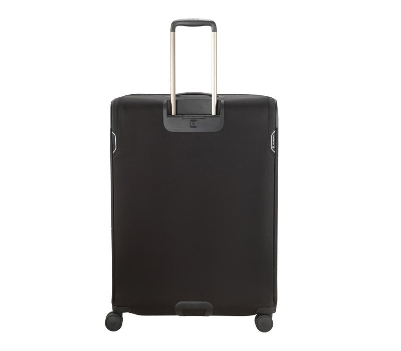 Alt text: Spacious black Victorinox Werks Traveler 6.0 Softside XL suitcase with durable nylon, smooth wheels, and innovative packing features.