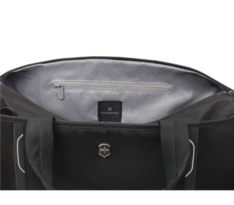 Sleek black Victorinox Weekender Duffle Bag with expandable capacity, zippered pocket, and rear sleeve for wheeled luggage.