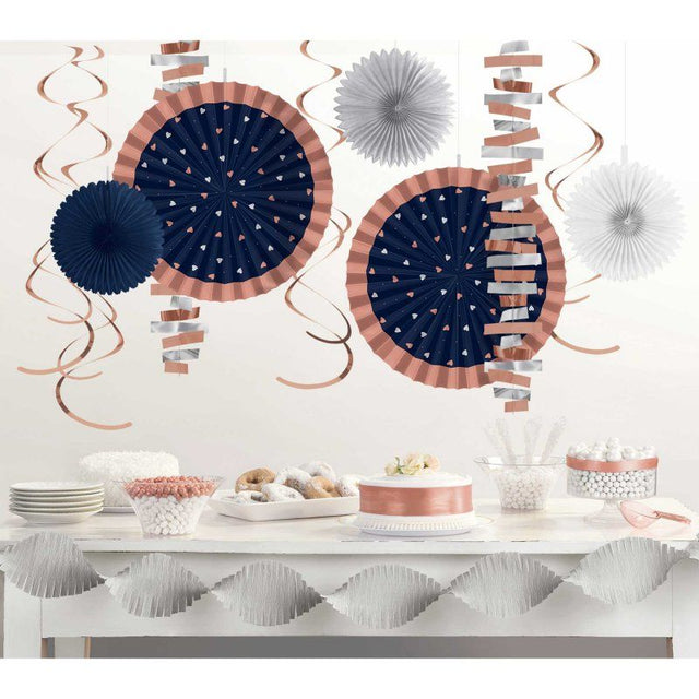 Navy-themed wedding decor kit with garlands, swirls, and fans for elegant celebration setups.