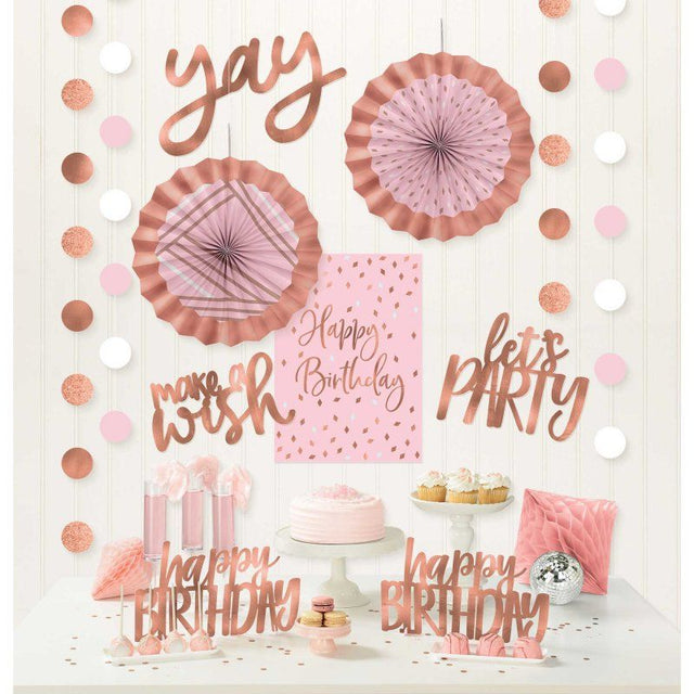 Blush Birthday Room Decorating Kit featuring string decorations, centerpieces, fans, and cutouts for elegant party decor.