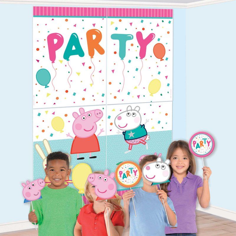 Peppa Pig party scene setter with vibrant decorations and photo props for unforgettable birthday celebrations.