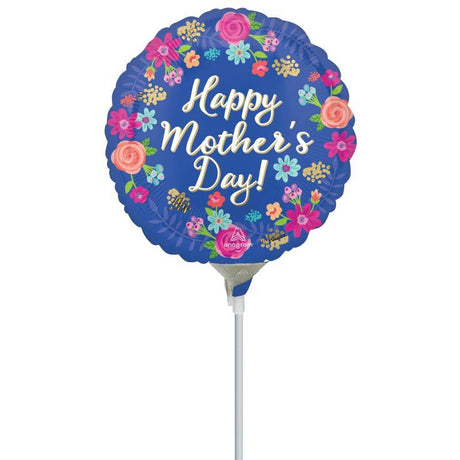 Foil balloon featuring "Happy Mother's Day" surrounded by delicate flowers, ideal for celebrating moms with elegance.