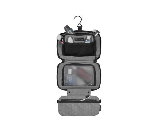 Zip-Around Travel Kit in black by Victorinox, featuring a compact tri-fold design and antibacterial lining for organized travel.