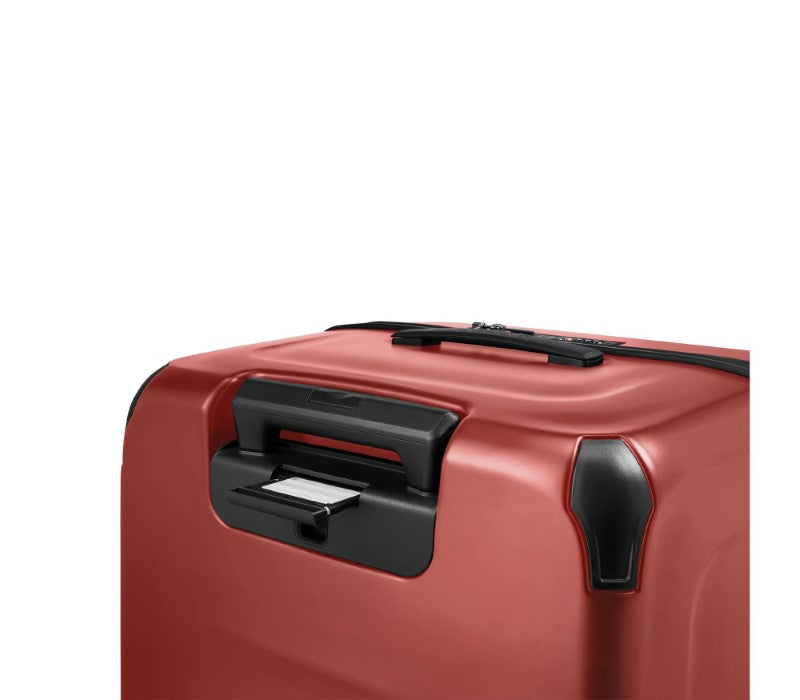 Large red Victorinox Spectra 3.0 suitcase with durable SORPLAS™ polycarbonate, 99L capacity, and smooth rolling wheels.