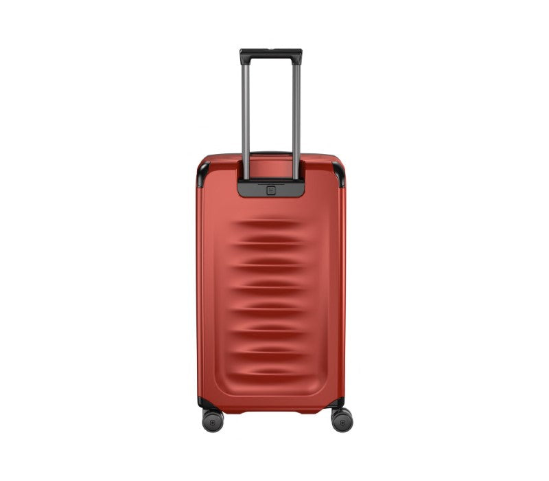 Large red Victorinox Spectra 3.0 suitcase with 99L capacity, dual-tube handle, and four smooth-rolling wheels.