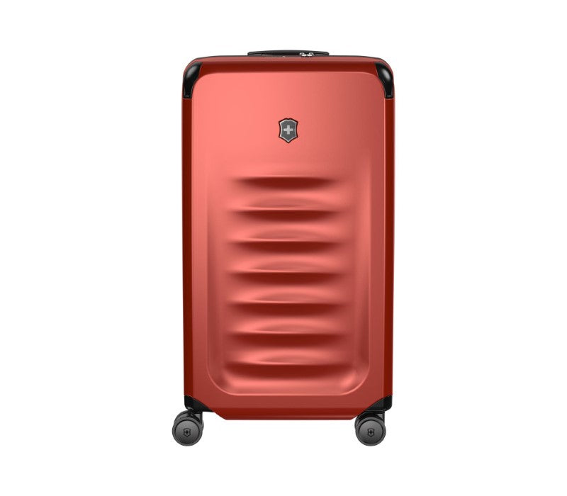 Red Victorinox Spectra 3.0 Trunk Large suitcase, 99L capacity, durable SORPLAS™ material, with dual wheels and packing cubes.