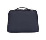 Elegant midnight blue Victorinox Victoria Signature Beauty Case with pockets, detachable pouch, and hanging hoop for travel convenience.