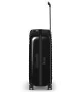 Victorinox Airox Medium 69 cm hardside luggage in black, featuring lightweight polycarbonate, 360° wheels, and ergonomic handles.