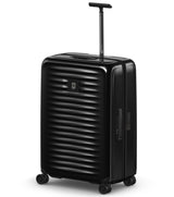 Sleek silver Victorinox Airox 75 cm hardside luggage, lightweight polycarbonate, smooth 360° wheels, TSA-approved lock.