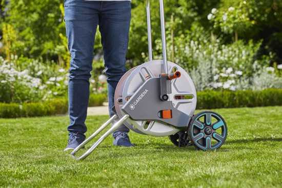 Gardena CleverRoll M Metal Hose Trolley: durable, space-saving design with ergonomic crank and anti-drip device for easy hose management.