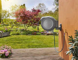 Gardena Roll Up Retractable Hose Reel with 30m hose features automatic retraction, 180° swivel, and tangle-free design for easy watering.