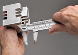 Starrett 125MEA Vernier Caliper: Precision measuring tool in stainless steel, features metric/inch scales and durable depth rod.