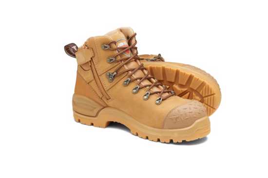 Wheat-colored zip-sided safety boots with steel toe, slip-resistant outsole, and moisture-wicking lining for comfort.