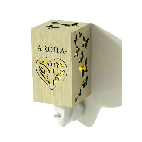 Aroha Wood Grain Plug In Night Light with soft ambient glow, ideal for children's rooms and hallways, featuring a stylish wood finish.