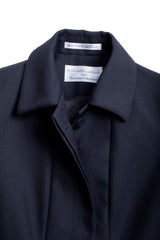 Elegant midnight lined overcoat for women, made of wool blend, featuring a concealed button front and side pockets.