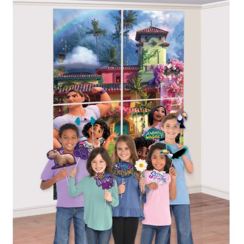 Vibrant Encanto scene setter with 4 large panels and 12 fun cardboard photo props for themed party decor.