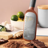 Coarse Paddle Grater by Berghoff with ergonomic handle, non-slip base, and sharp blade for effortless grating.