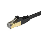 1.5 m black CAT6a shielded Ethernet cable with snagless connectors, ensuring reliable 10Gbps connections for high-performance networking.