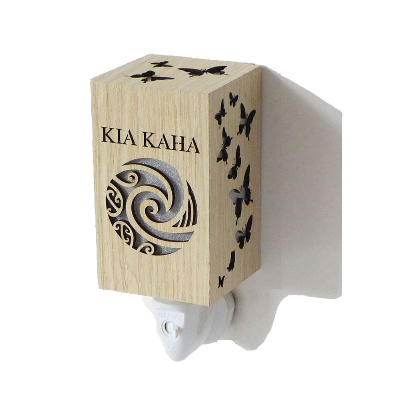 Stylish Kia Kaha wood grain plug-in night light, ideal for children's rooms or hallways, offering warm, soothing illumination.