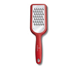 Victorinox Coarse Grained Grater in red, featuring a sharp blade and slip-resistant feet for effortless grating of various foods.