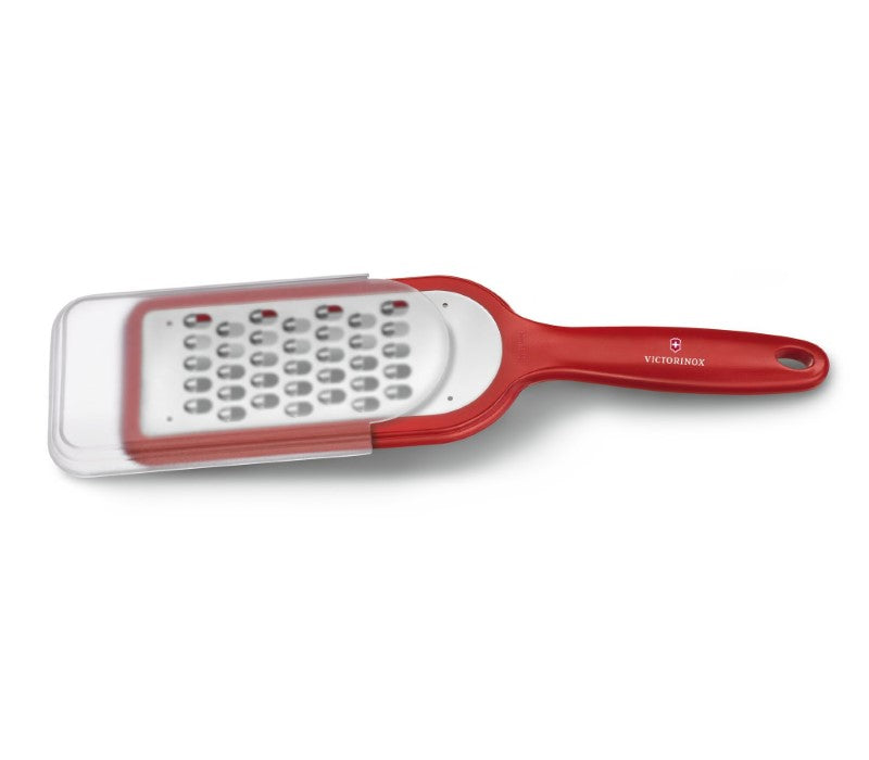 Victorinox coarse-grained grater in red, perfect for grating vegetables, fruits, and chocolate with ergonomic design and slip-resistant feet.