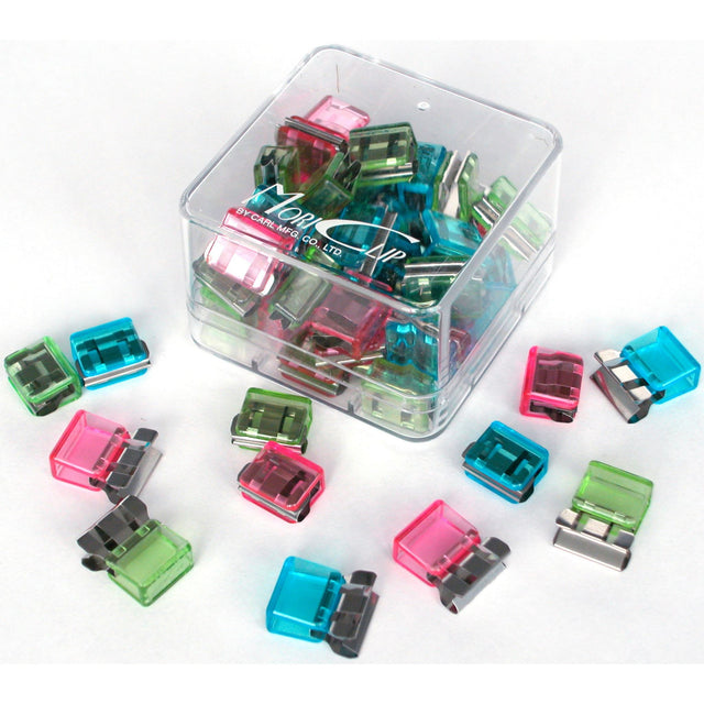 Assorted translucent paper clips by Carl Mori, holds up to 30 sheets, perfect for stylish document organization.