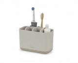 Joseph Joseph EasyStore toothbrush caddy in Ecru, featuring multiple compartments, ventilation, and a sleek design for organized dental care.