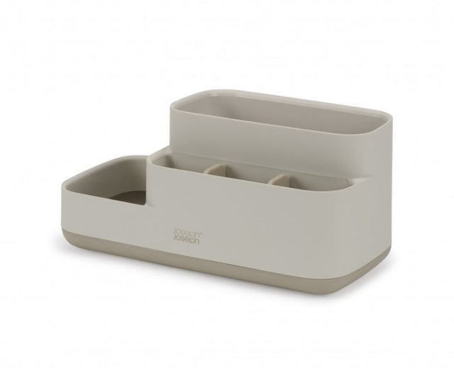 Joseph Joseph EasyStore Bathroom Caddy in Ecru with varied compartments for organized storage of grooming essentials.