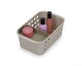 Joseph Joseph EasyStore Bathroom Storage Basket with ventilated sides, moveable tray, perfect for organizing bathroom essentials.