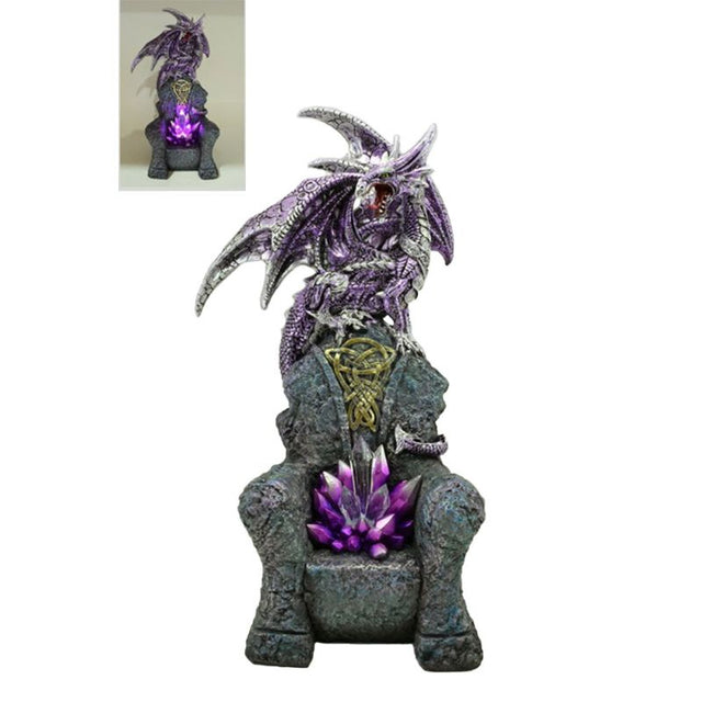 A hand-painted dragon on a throne with glowing purple LED crystals, perfect for gothic decor and fantasy enthusiasts.